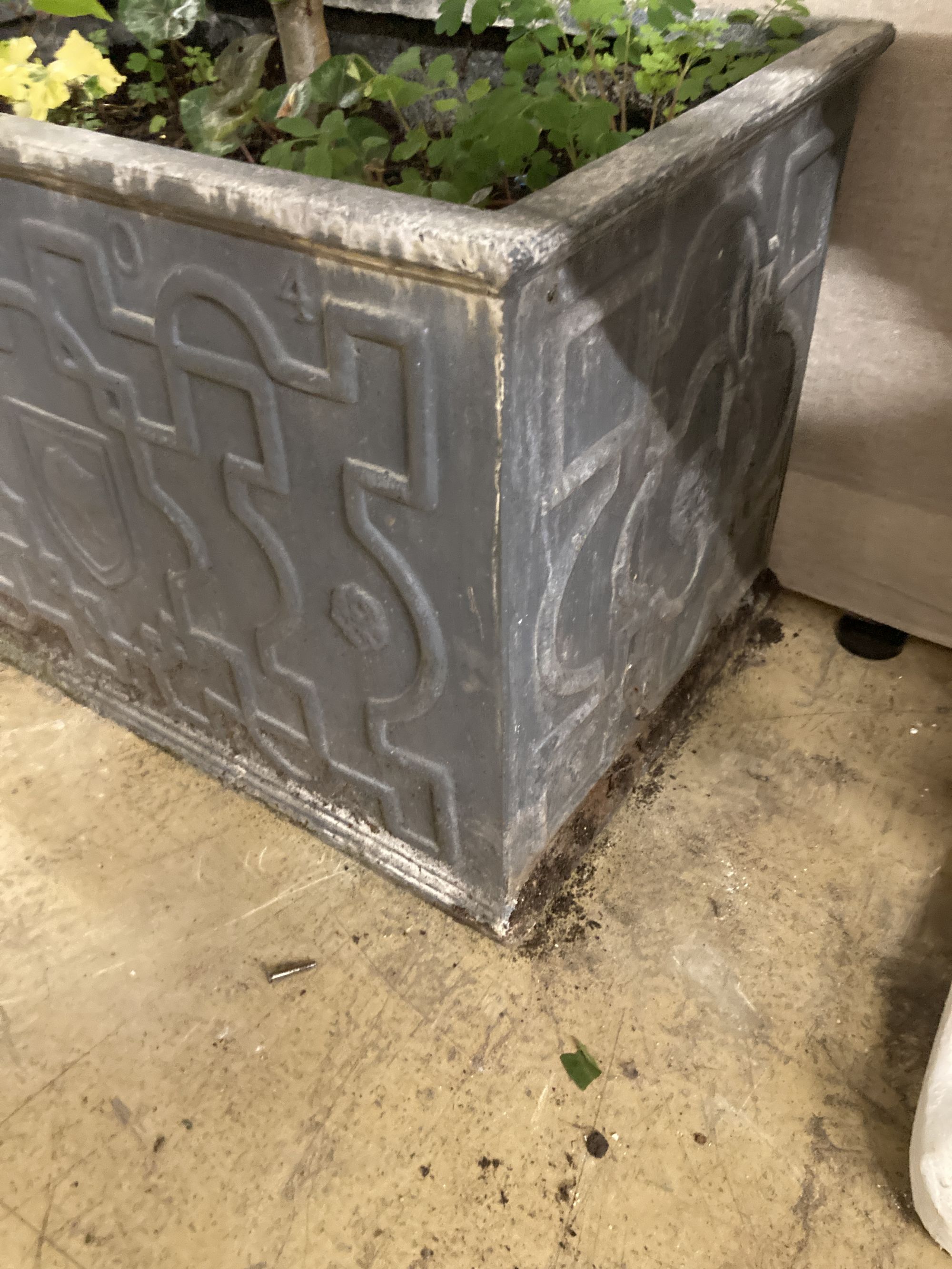 A rectangular faux lead garden planter, width 66cm, depth 46cm, height, 46cm with large bay tree(?)